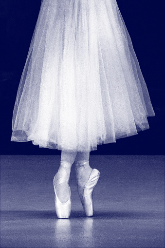 Ballerina legs at rehearsal. Unrecognizable person