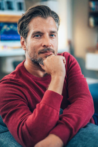 istock Portrait of man at home 1454232048