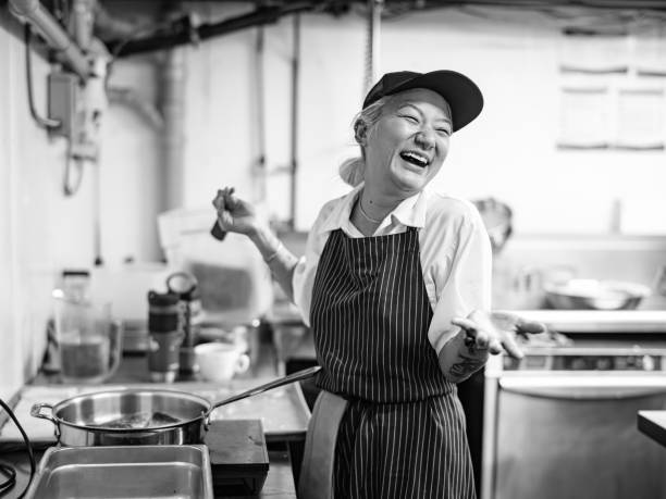 Young Asian male cook is worried in the kitchen