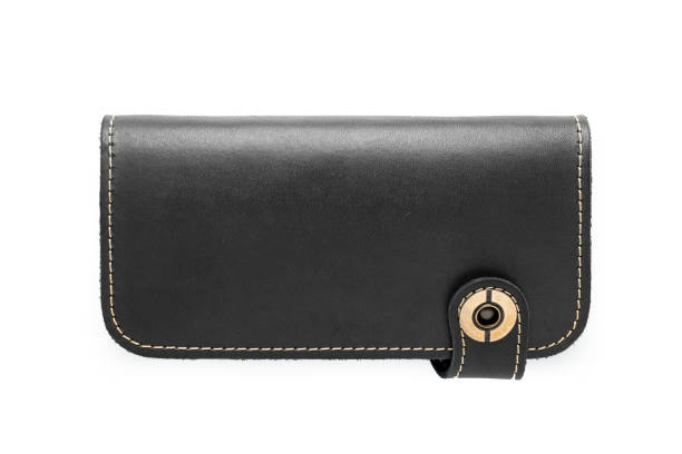 istock Big black leather wallet on a button on a white background, top view 1454233907