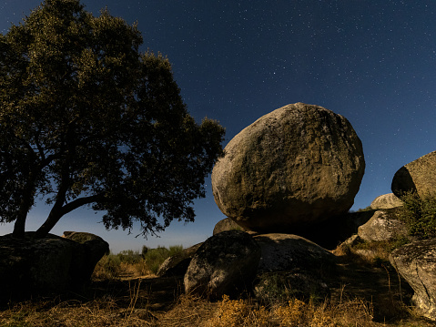 A landscape with big stones at night in Barruecos Natural Area, Spain