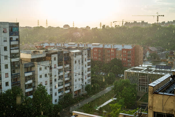 istock Raining over residential city quarter 1454238058