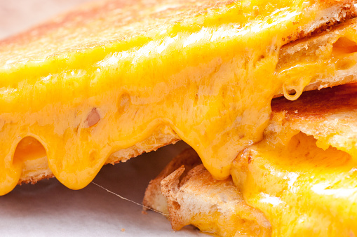 gooey grilled cheese sandwiches with oozing cheese
