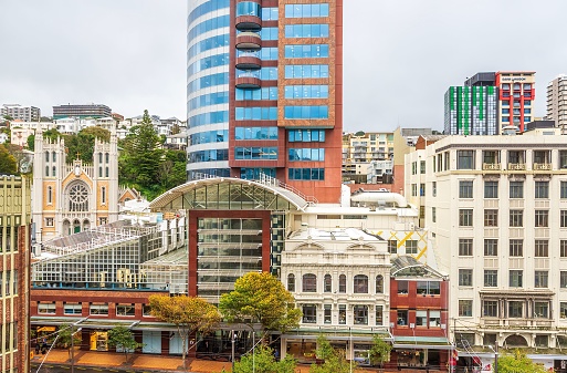 Wellington, New Zealand – May 29, 2014: A skyline of the city center with Willis St, Majestic center, and the Terrace hills in the back