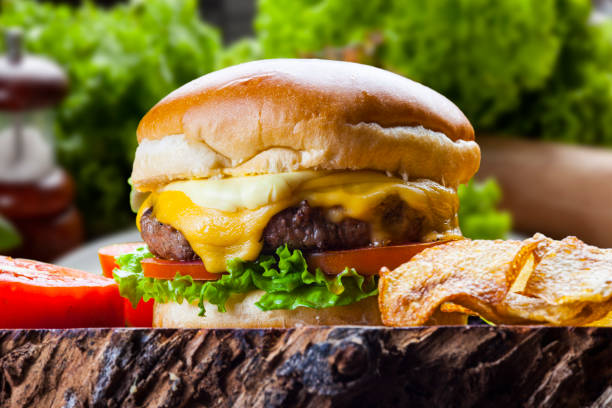 istock Delicious hamburger with meat bun and vegetables 1454240926