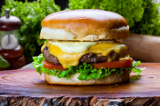 istock Delicious hamburger with meat bun and vegetables 1454241698