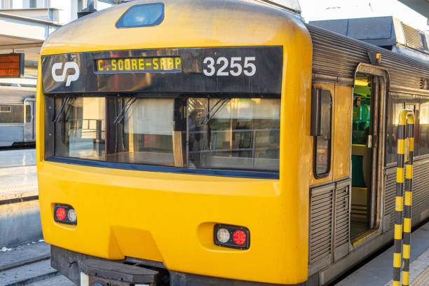 yellow trains of CP, Portugal Railways, stopped on the platform of Cais do Sodré station stock photo