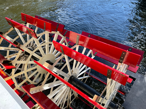 Close up view of a working paddle wheel on a riverboat.