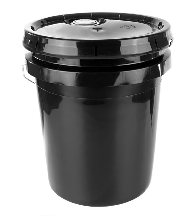 Black 5 gallon pail isolated on a white background.  Good for product shots.  Bucket.