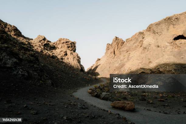 Scenic View Of Desert Landscape Stock Photo - Download Image Now - Mountain, Rock - Object, Footpath