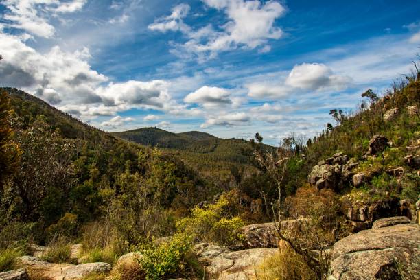 istock Mountains under a blue cloudy sky on a sunny day 1454249764