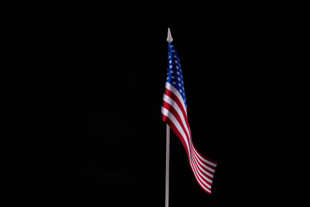 American flag on dark background. Copy text.