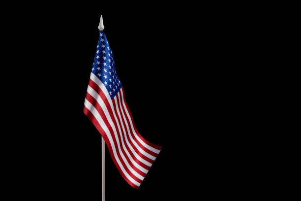 istock American flag on dark background. Copy text. 1454254913