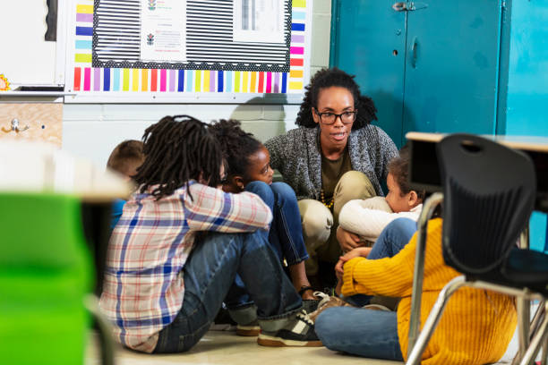 Teacher and children doing school safety drill, lockdown