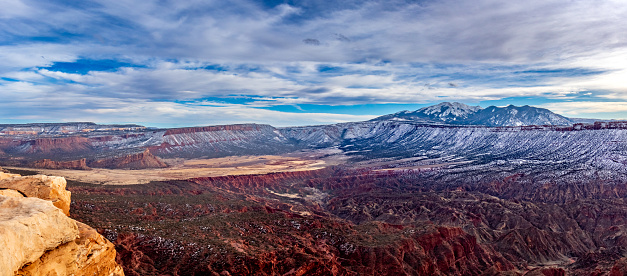 Beautiful view above Fisher Valley and Onion Creek with the La Sal Mountains in the southern background, near Moab, Utah.