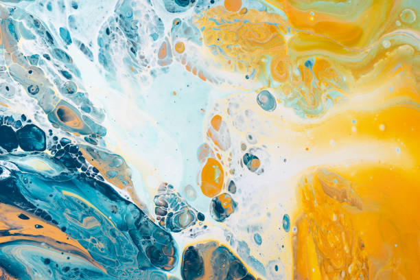 Fluid art painting. Abstract decorative marble texture. Background with liquid acrylic. Mixed paints for poster or wallpaper. Modern art. Psychedelic  colors. Blue, golden, red, yellow, orange.