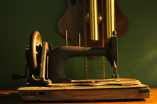 An old and antique sewing machine.