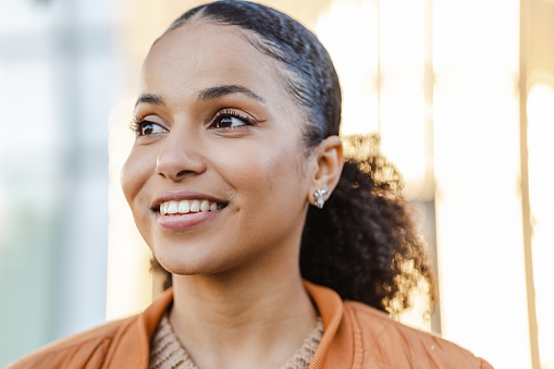Cropped shot of beautiful African-American woman smiling