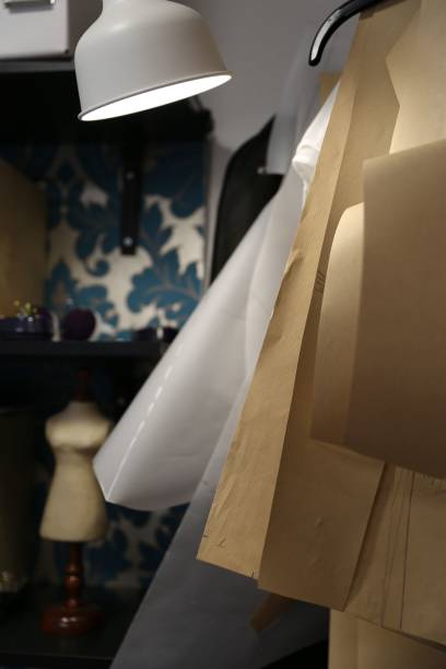 istock Vertical shot of fabric material for making dresses in a room 1454261833
