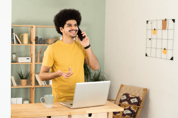 istock Young African-American man working at his home office 1454262084