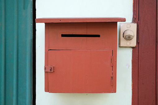 Outdoor red wooden mailbox, Chiang Mai Thailand.