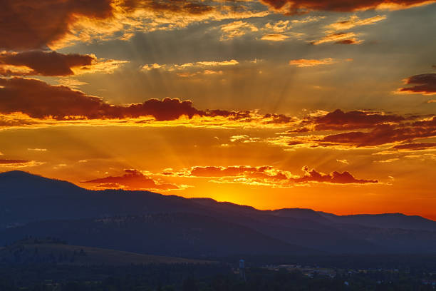 Hazy forest fire sunset over Missoula