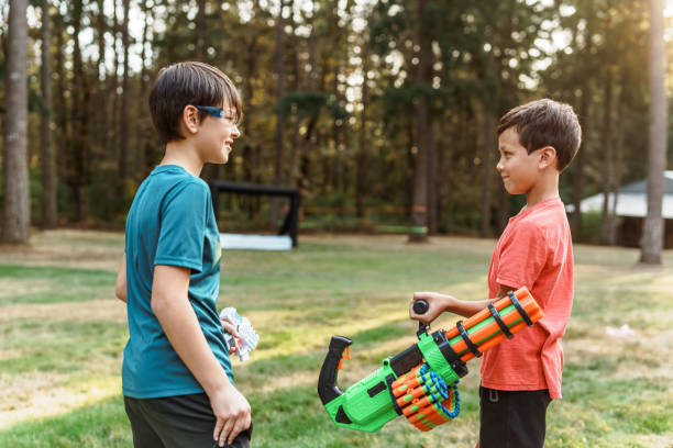Boys talking and playing together outside