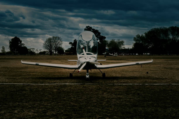 istock Airplane parked while an airplane is landind 1454268950