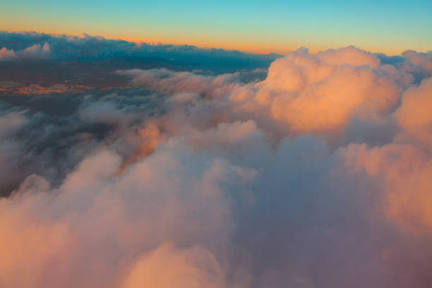 istock Flying in amazing clouds 1454275218