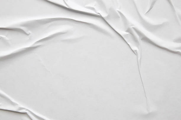 istock white crumpled and creased paper poster texture background 1454276845