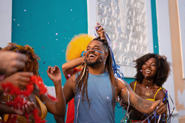 People throwing confetti at Brazilian Carnaval