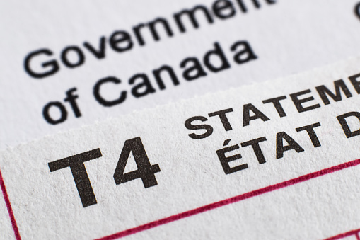 Closeup T4 Government of Canada statement for income tax filing