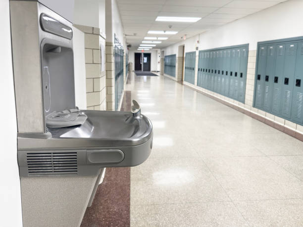 istock Drinking fountain in school corridor 1454280942