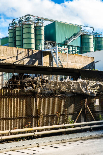 istock Industrial Plant Behind Chainlink Fence 1454290852