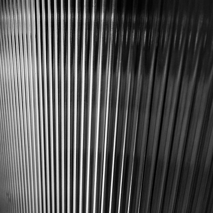 Iron wall with wavy stripes