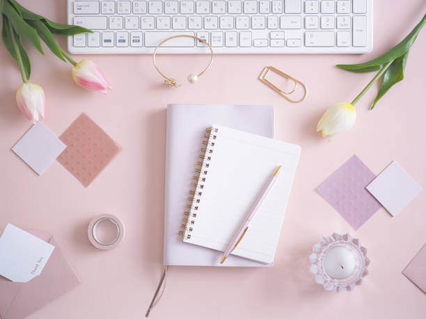 istock Pink flat lay top view women's office desk, women's workspace 1454301448