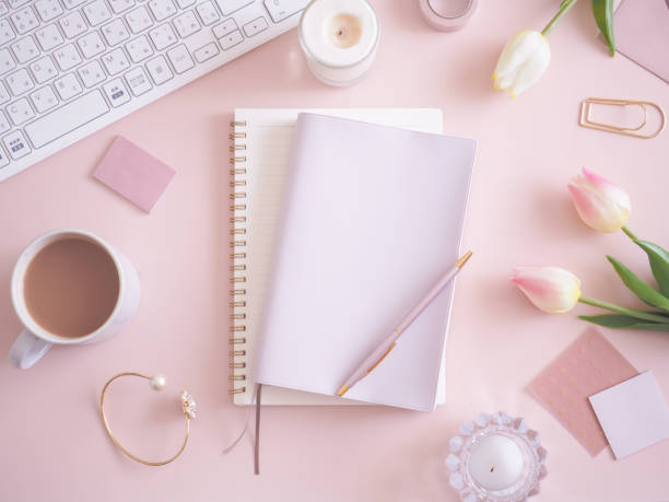 istock Pink flat lay top view women's office desk, women's workspace 1454301450