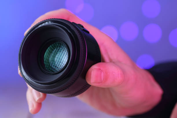 istock chinese 50mm lens in hand 1454302072