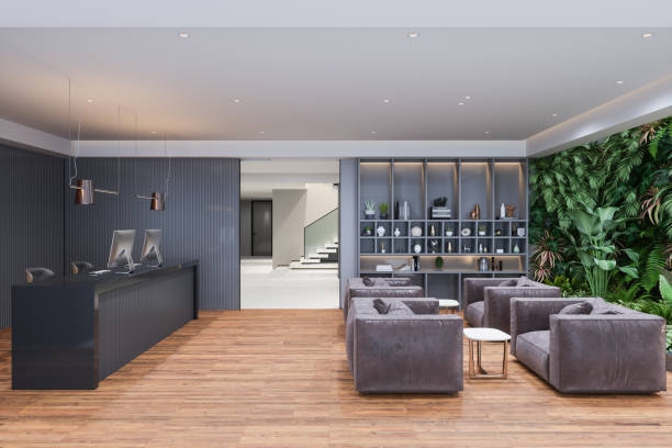 istock Modern Lobby Interior With Reception Desk, Waiting Area And Walled Garden 1454305217