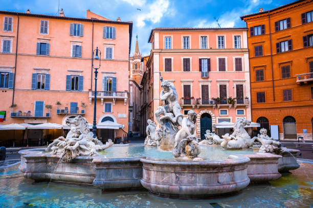 istock Piazza Navona square fountain and colorful architecture view 1454307104