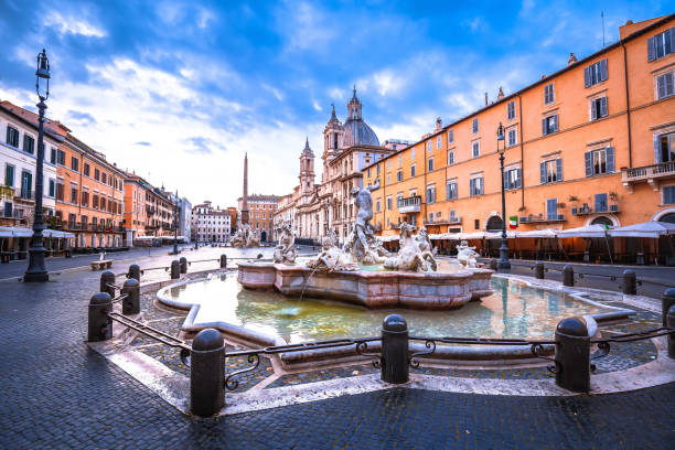istock Piazza Navona square fountain and church view 1454307119