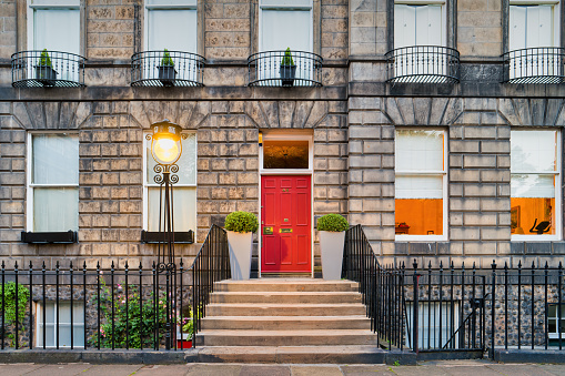 Typical townhouse and front door in the New Town district of Edinburgh, Scotland, UK in the evening.