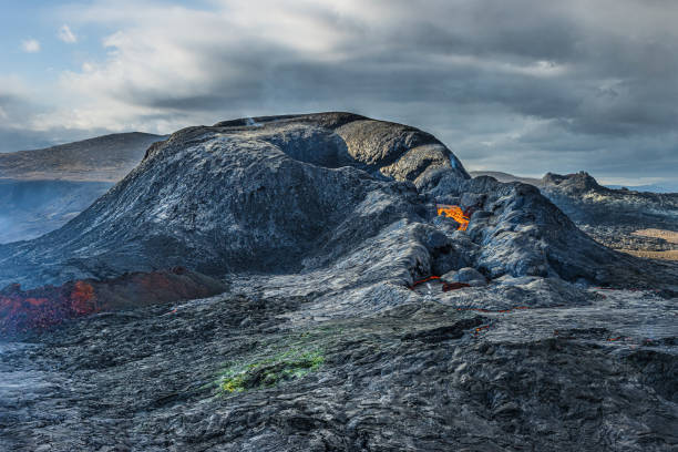 istock volcanic crater during the day with some lava 1454311071