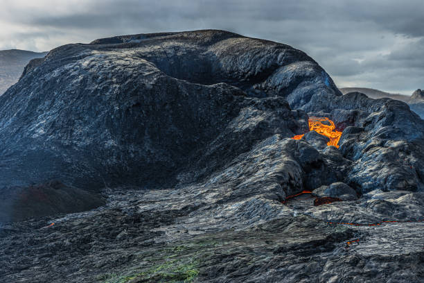 istock active volcanic crater during the day with some lava 1454311092