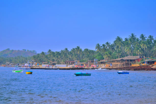 istock Boats sailing at Anjuna beach in Goa. 1454312676