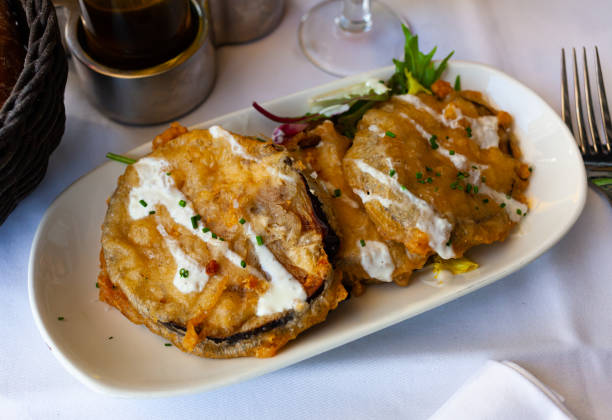 istock Battered eggplant slices with yogurt sauce 1454328649