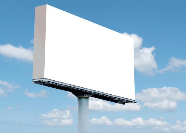 istock Outdoor billboard on blue sky background with clipping path 1454328680