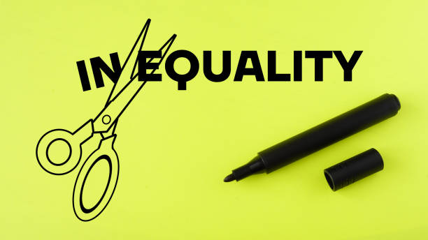 istock Scissors cut the word Equality from inequality. 1454329073