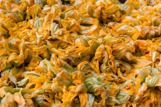 istock Bright yellow squash blossoms - perfect for wallpapers 1454329855