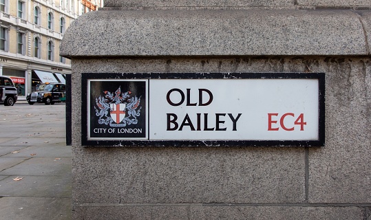 London, United Kingdom – October 28, 2022: A street sign on the corner of Old Bailey and Newgate Street in London, United Kingdom.